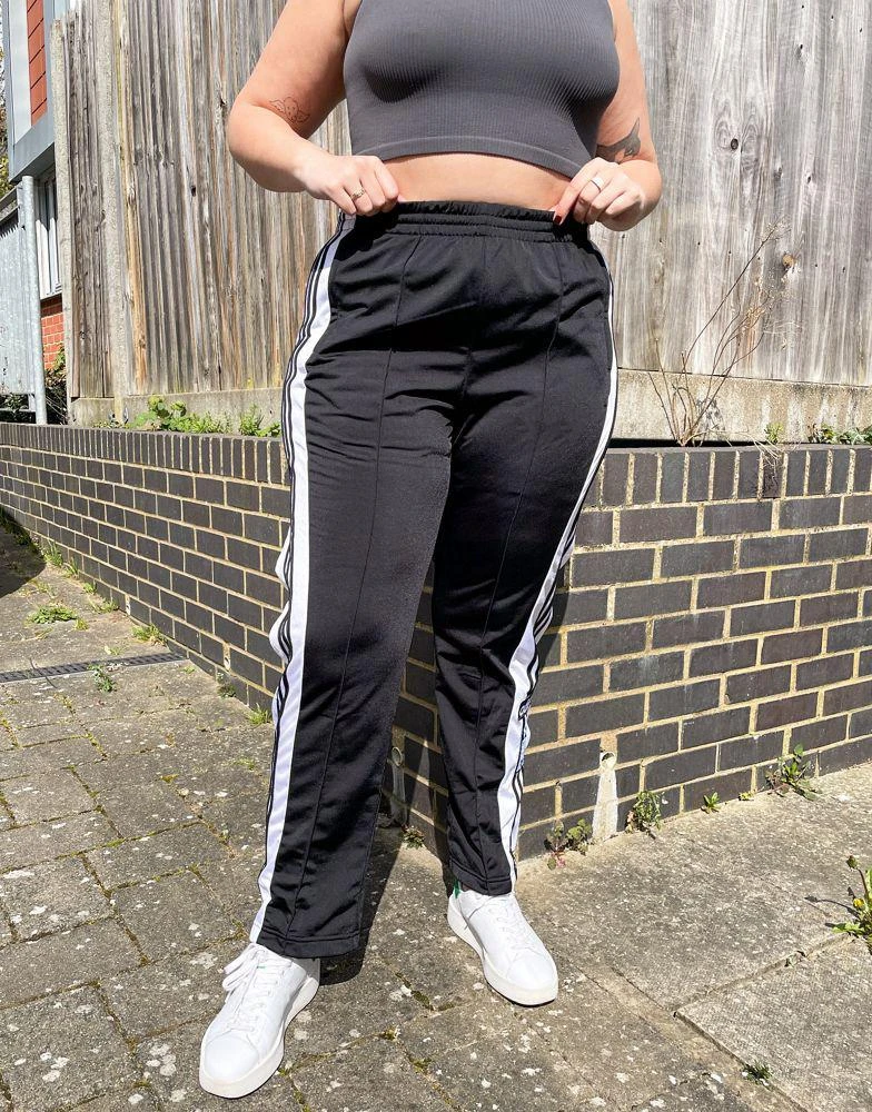 商品Adidas|排扣裤,价格¥589,第4张图片详细描述