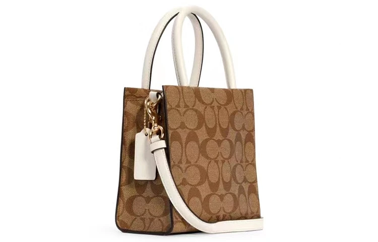 商品[国内直发] Coach|蔻驰 Cally 17 经典拼色老花 帆布配皮 纸袋包琴谱包托特包Tote包购物袋手提单肩斜挎包 迷你 女款 白色配棕色老花,价格¥1491,第3张图片详细描述