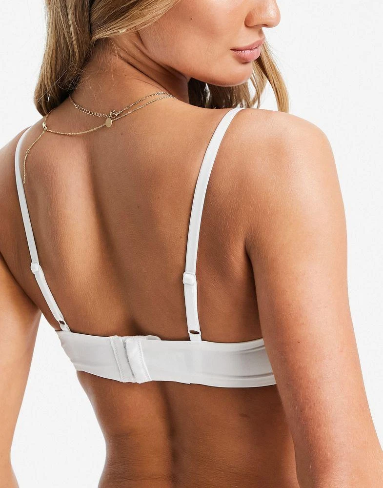 商品Puma|Puma soft padded t-shirt bra in white,价格¥259,第2张图片详细描述