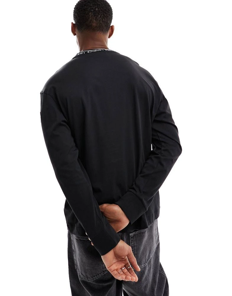 商品Calvin Klein|Calvin Klein unisex running logo long sleeve t-shirt in black,价格¥483,第4张图片详细描述