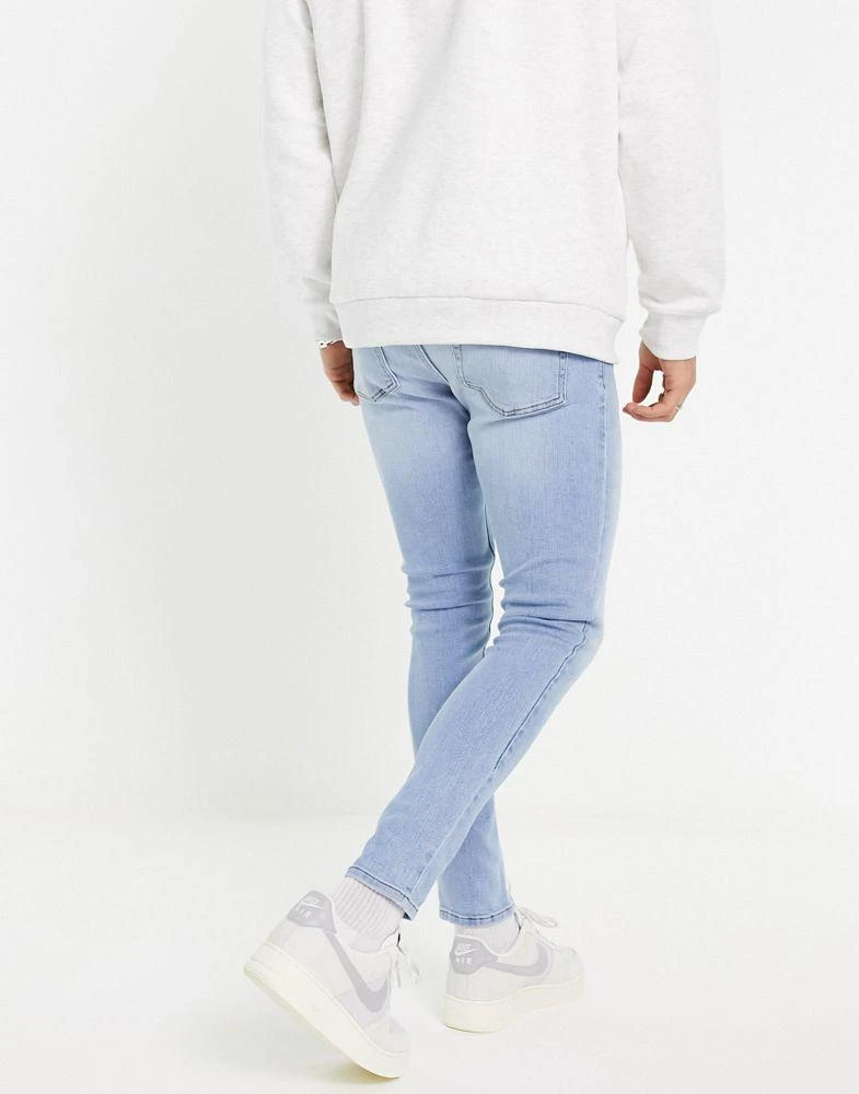 商品ASOS|ASOS DESIGN power stretch jeans in light wash blue,价格¥118,第4张图片详细描述