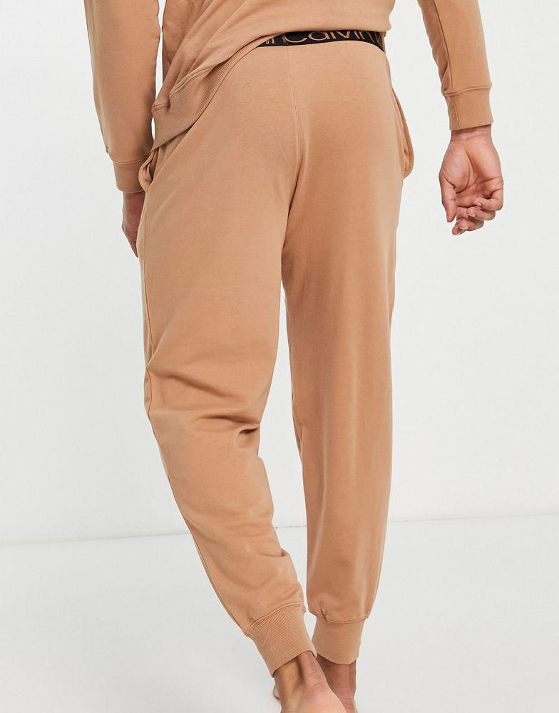商品Calvin Klein|Calvin Klein contrast waistband lounge joggers in camel co-ord,价格¥404,第5张图片详细描述