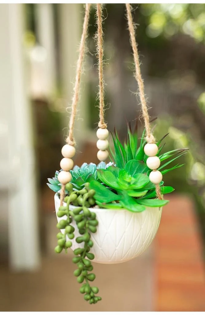 商品FLORA BUNDA|Matte White Caveman Ceramic Hanging Planter,价格¥215,第5张图片详细描述