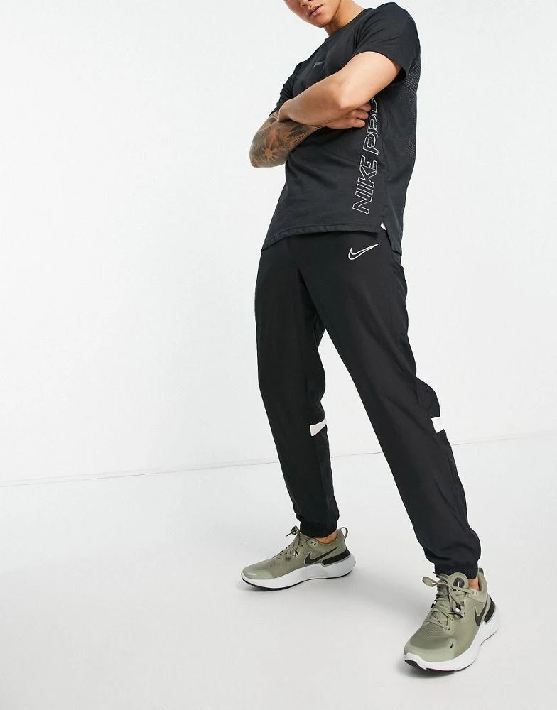 商品NIKE|Nike Football Dri-FIT Academy track pant in black,价格¥340,第1张图片