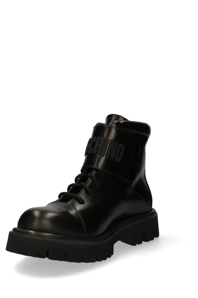商品Moschino|Moschino Logo Embossed Buckled Boots,价格¥4178,第3张图片详细描述