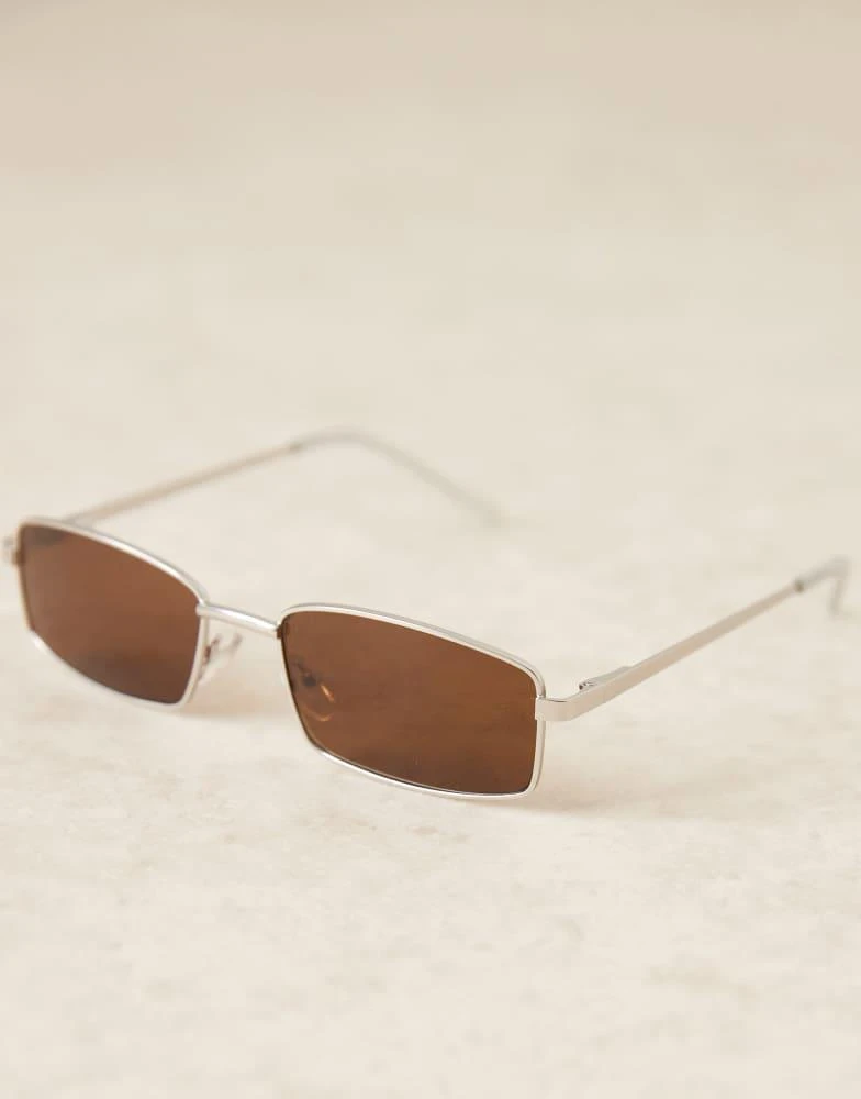 商品ASOS|ASOS DESIGN metal rectangle sunglasses with matte silver frame and brown lens,价格¥165,第2张图片详细描述