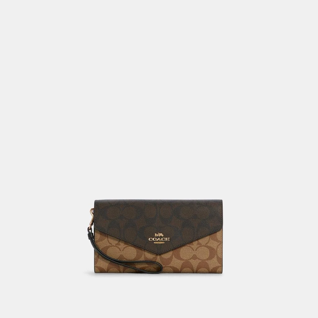 商品Coach|Coach Outlet Travel Envelope Wallet In Blocked Signature Canvas,价格¥995,第2张图片详细描述