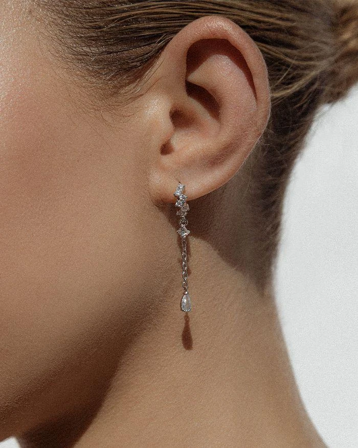 商品Shashi|Letitia Cubic Zirconia Chain Charm Huggie Hoop Earrings in White Gold Tone Sterling Silver,价格¥507,第2张图片详细描述