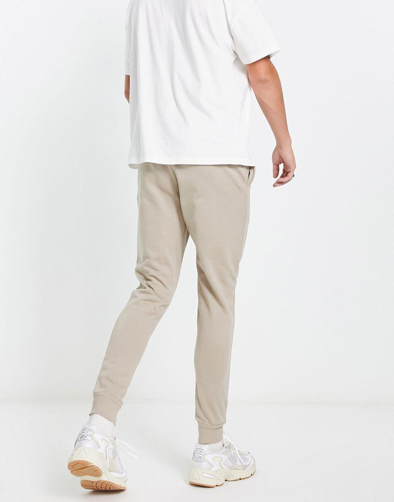 ASOS DESIGN 2 pack skinny joggers in beige/black商品第2张图片规格展示