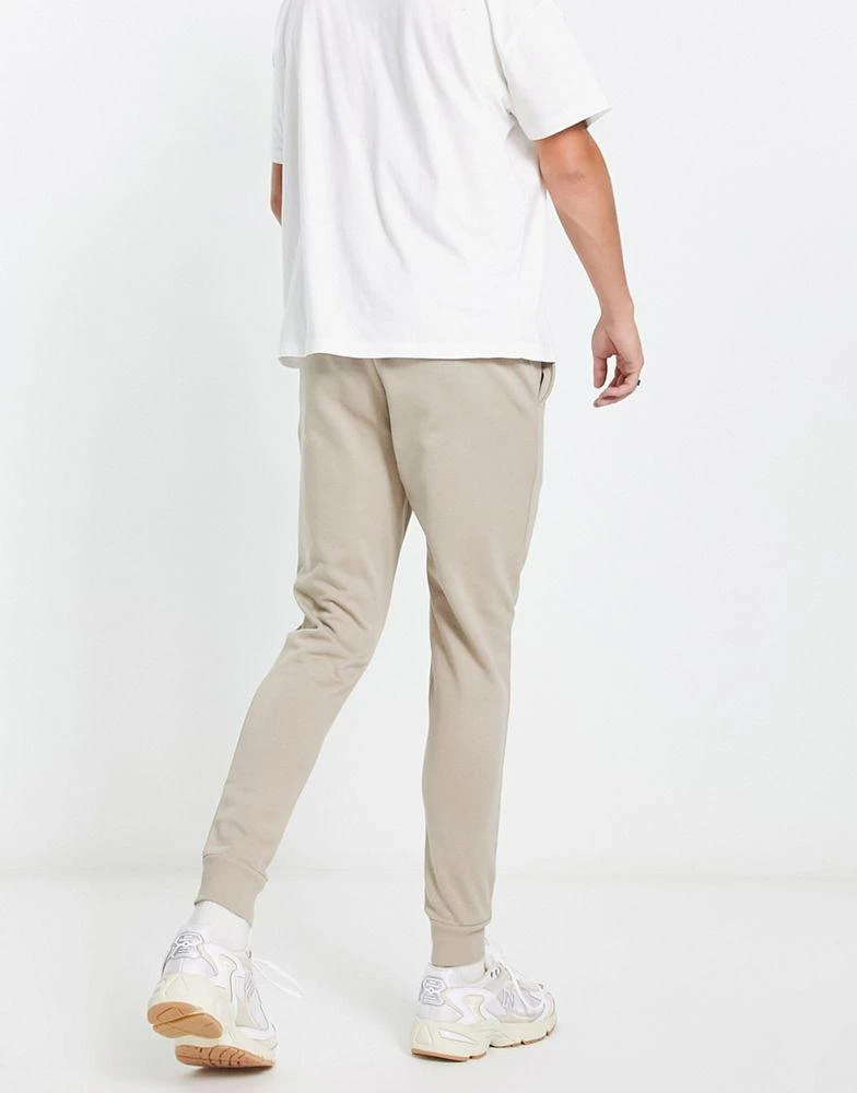 商品ASOS|ASOS DESIGN 2 pack skinny joggers in beige/black,价格¥310,第2张图片详细描述