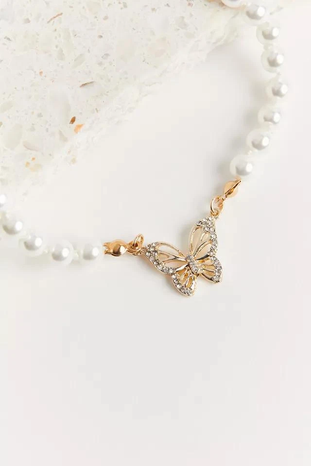 商品Urban Outfitters|Dolly Pearl Charm Necklace,价格¥75,第2张图片详细描述