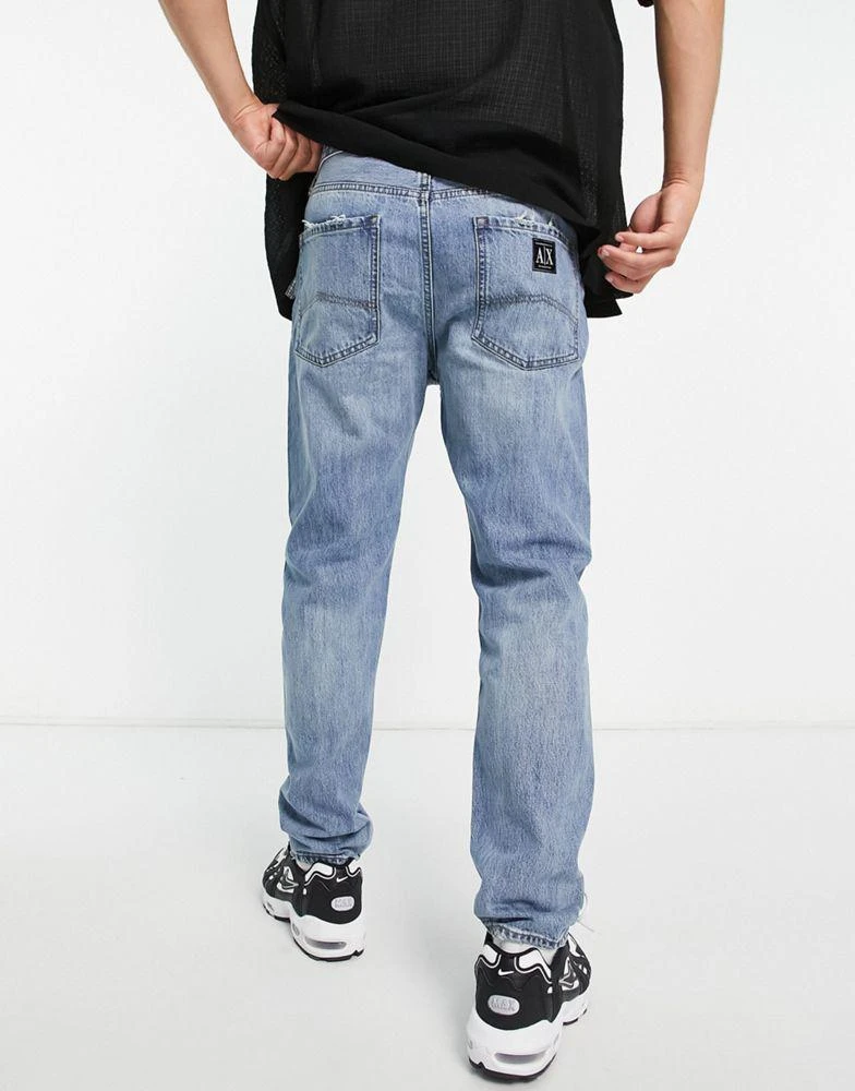 商品Armani Exchange|Armani Exchange tapered jeans in light wash blue,价格¥595,第2张图片详细描述