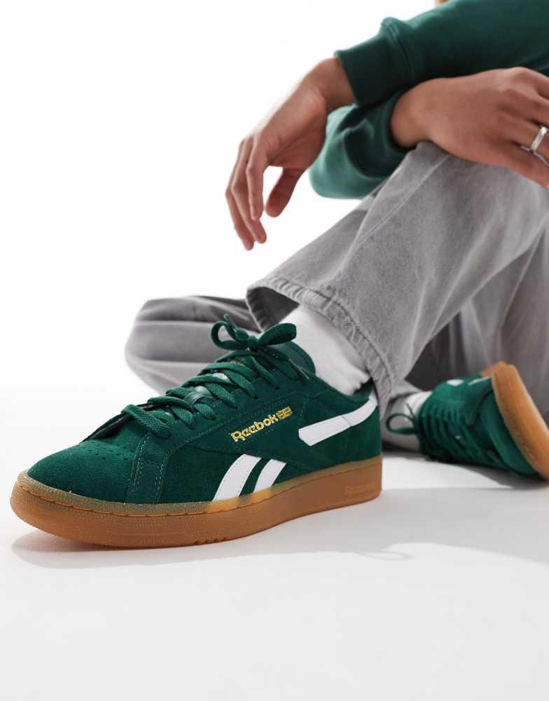 Shop Reebok Club C Grounds suede trainers with gum sole in green