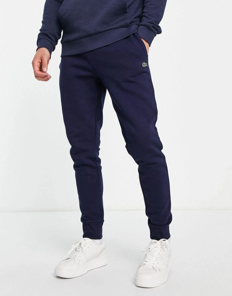 商品Lacoste|Lacoste cotton joggers in navy,价格¥570,第1张图片