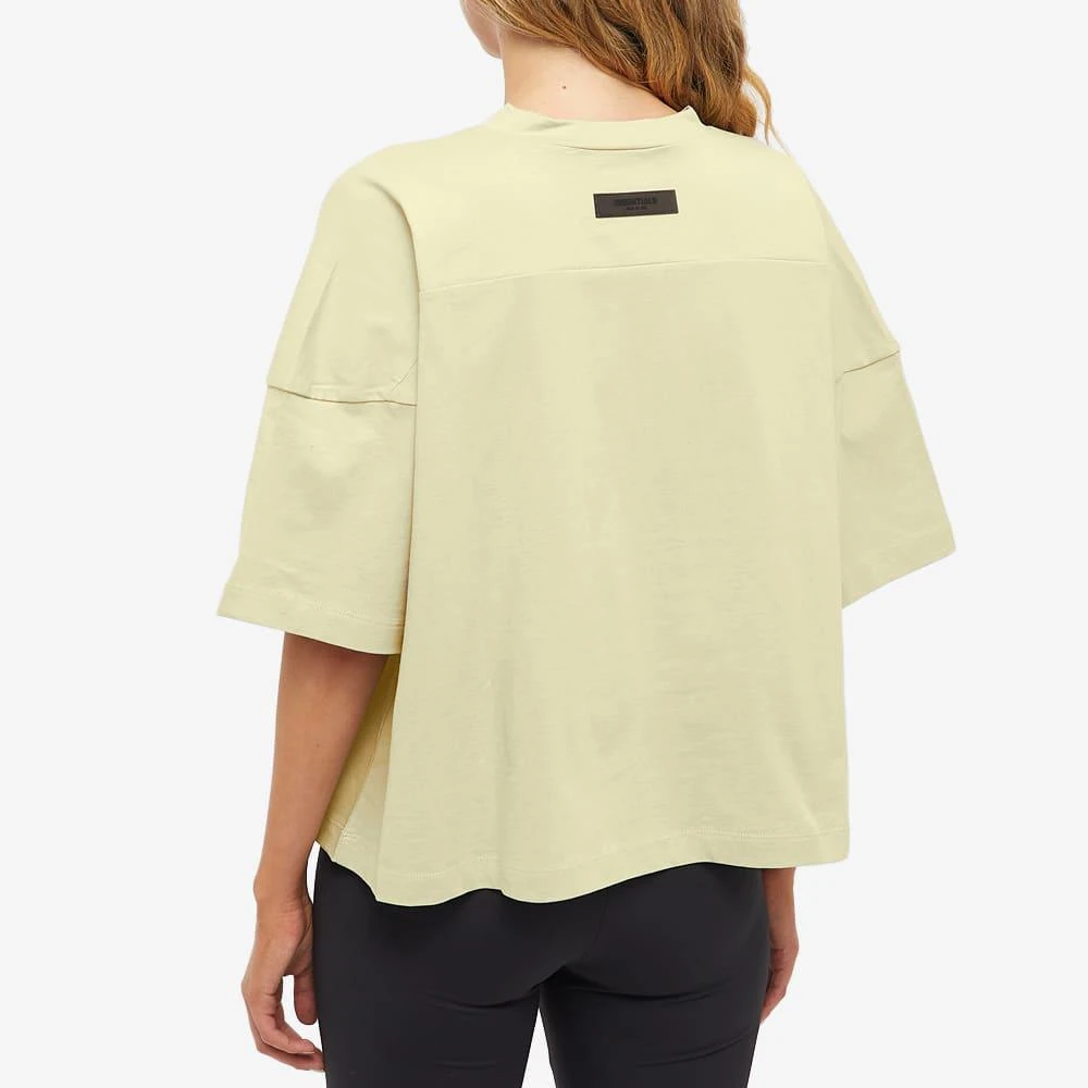 商品Essentials|Fear of God ESSENTIALS Women's Logo Football Tee - Wheat,价格¥445,第3张图片详细描述