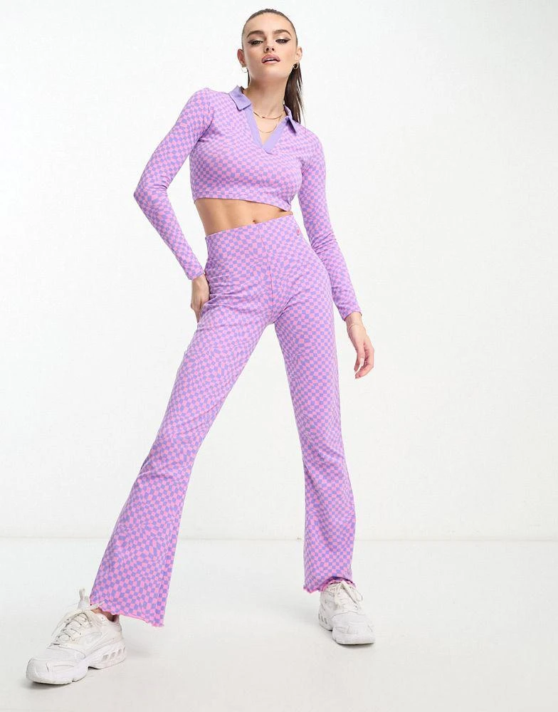 商品Fila|Fila warped check collared long sleeve top in pink and purple,价格¥130,第2张图片详细描述