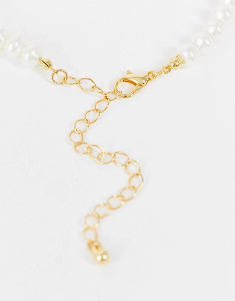 商品ASOS|ASOS DESIGN 14k gold plated necklace with glass pearls and dolphin pendant,价格¥48,第3张图片详细描述