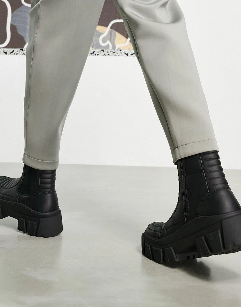 商品ASOS|ASOS DESIGN chelsea calf boots on chunky sole in black faux leather with padded detail,价格¥337,第2张图片详细描述