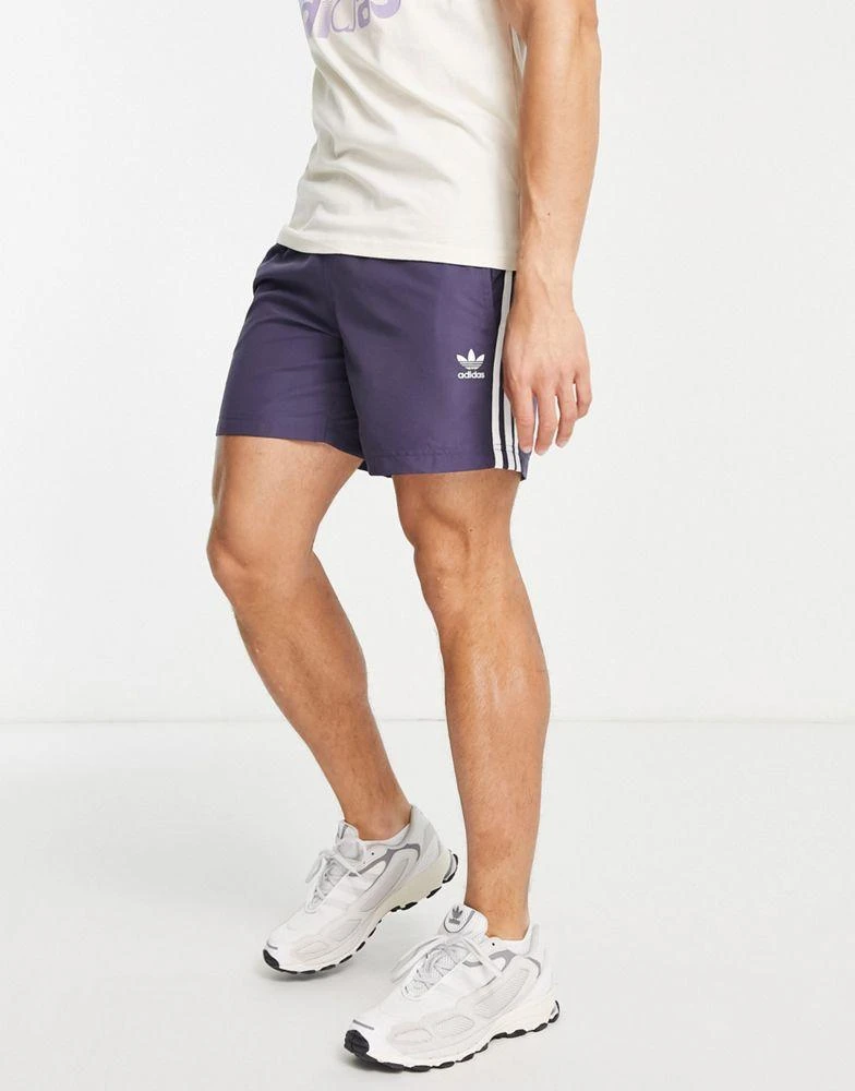 商品Adidas|adidas Originals adicolor three stripe swim shorts in navy,价格¥358,第3张图片详细描述