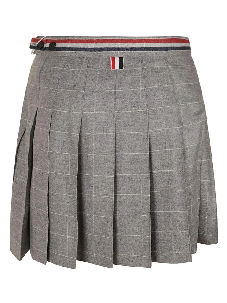 商品Thom Browne|Thom Browne Thigh Length Dropped Back Pleated Skirt,价格¥5959,第2张图片详细描述