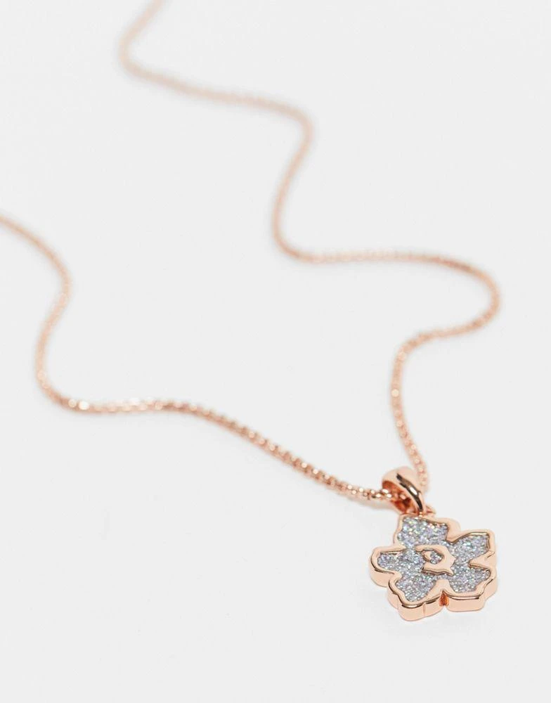 商品Ted Baker London|Ted Baker Magnolia necklace with floral pendant in rose gold with silver glitter,价格¥335,第4张图片详细描述