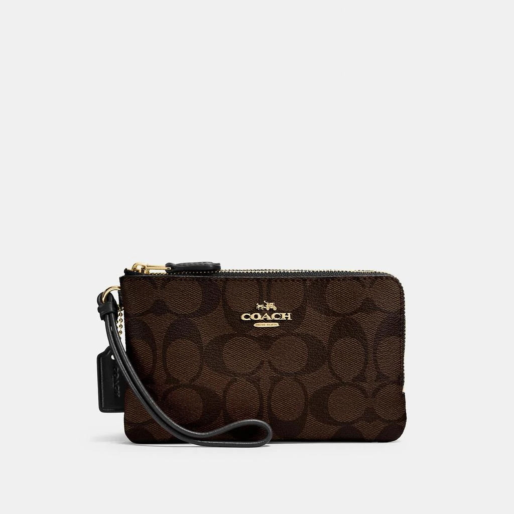 商品Coach|蔻驰经典帆布手拿包,价格¥218,第1张图片
