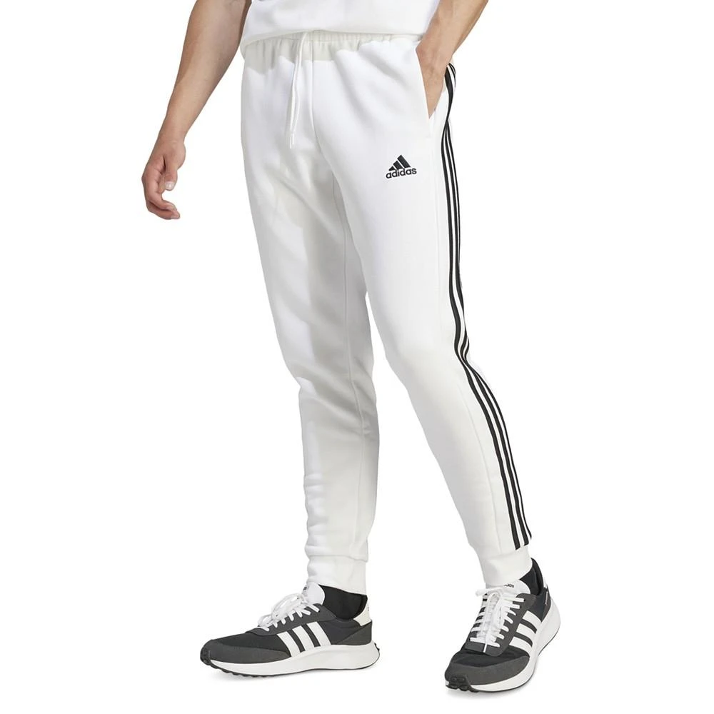 商品Adidas|Men's Essentials 3-Stripes Regular-Fit Fleece Joggers, Regular and Big & Tall,价格¥368,第1张图片详细描述
