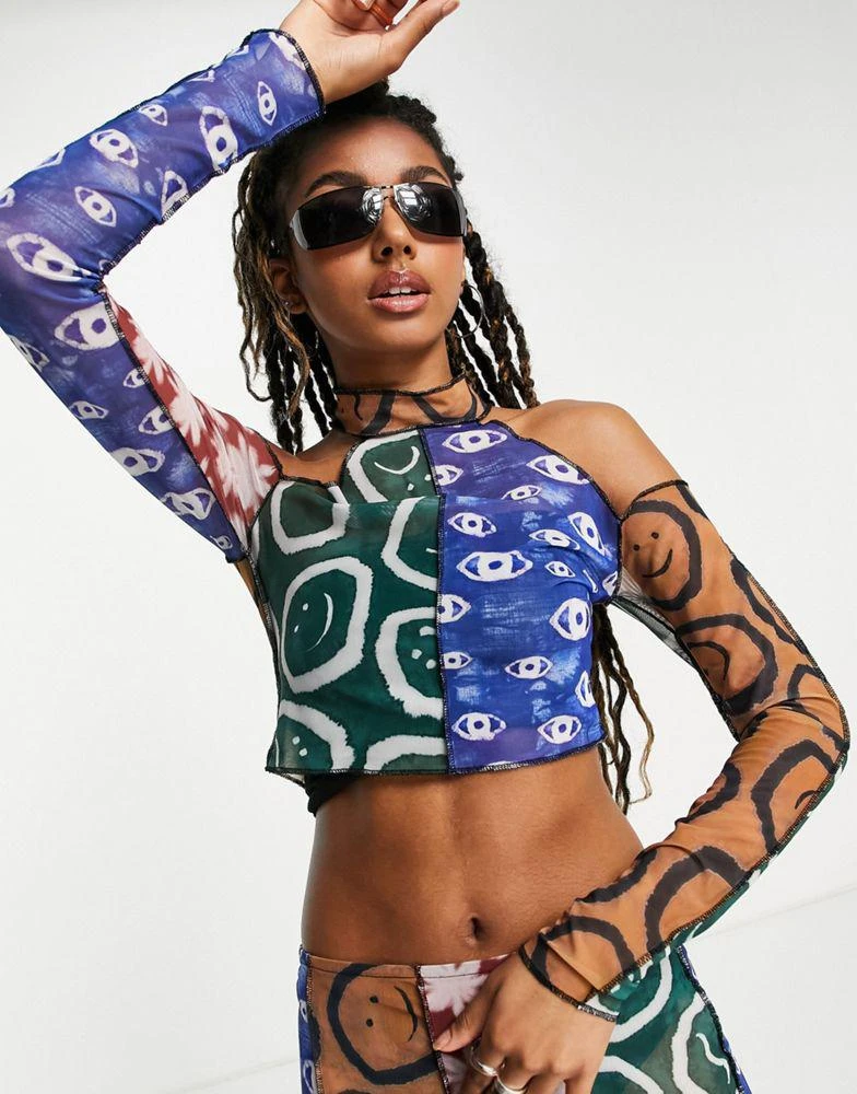 商品The Ragged Priest|The Ragged Priest cold shoulder high neck crop top in batik print mesh co-ord,价格¥263,第1张图片