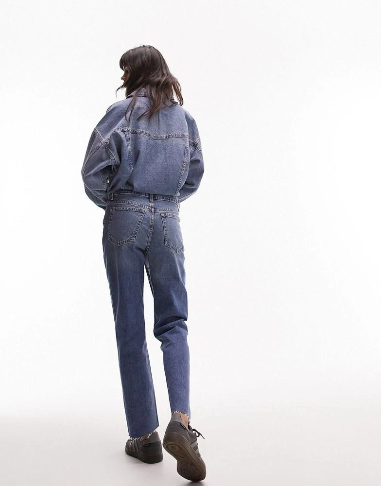 商品Topshop|Topshop mid rise straight jeans with raw hem in mid blue,价格¥285,第4张图片详细描述