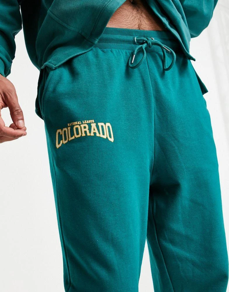 商品ASOS|ASOS DESIGN co-ord oversized joggers in green with Colorado city print,价格¥109,第3张图片详细描述