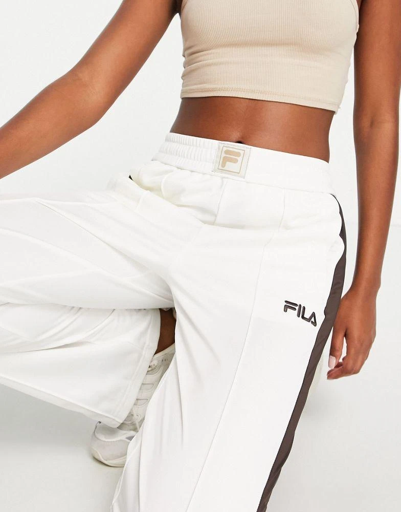 商品Fila|Fila unisex straight leg track bottoms in cream,价格¥354,第3张图片详细描述