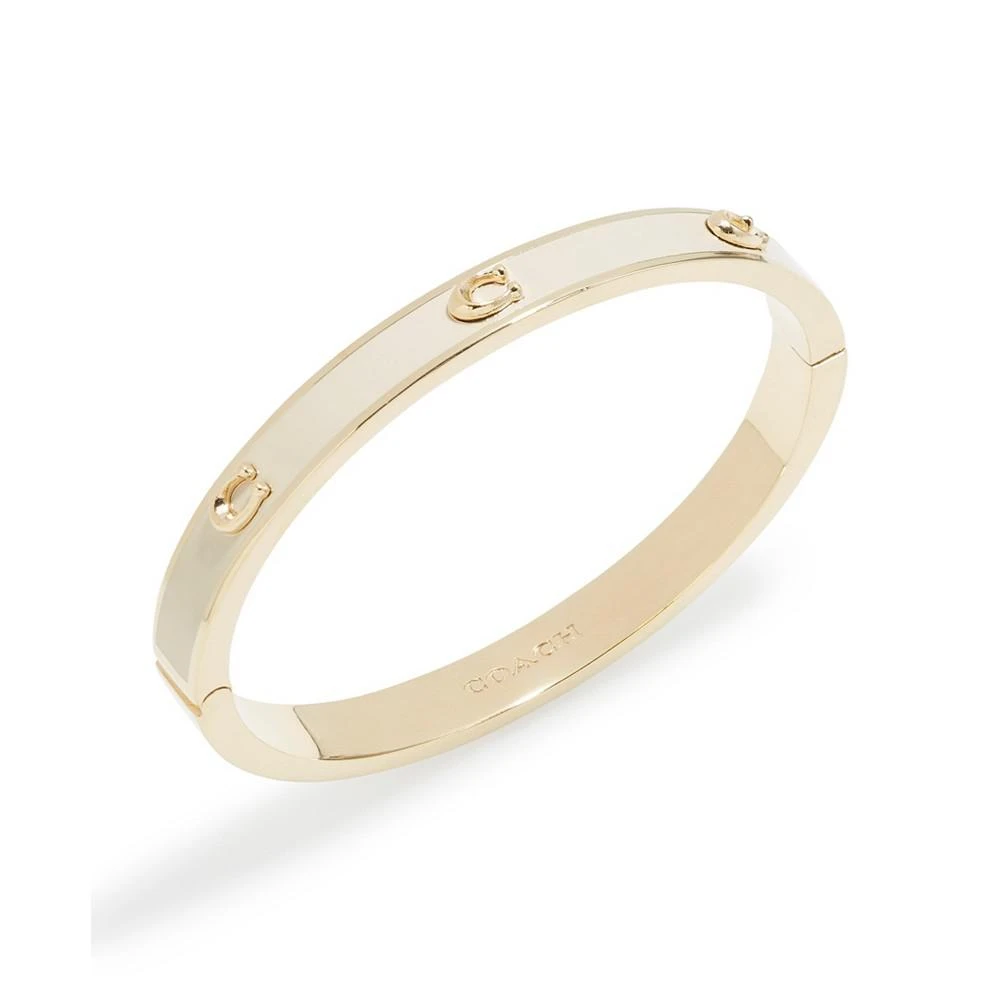 商品Coach|Signature Hinged Bangle Bracelet,价格¥711,第2张图片详细描述