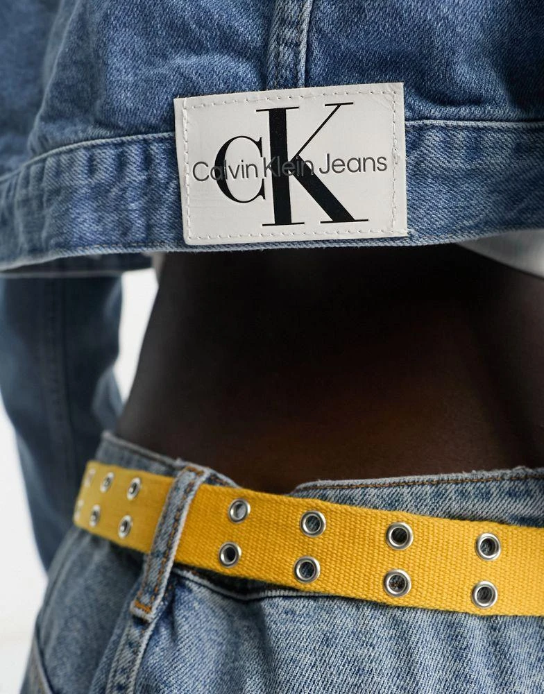 商品Calvin Klein|Calvin Klein Jeans co-ord extreme crop 90s denim jacket in mid wash,价格¥879,第4张图片详细描述