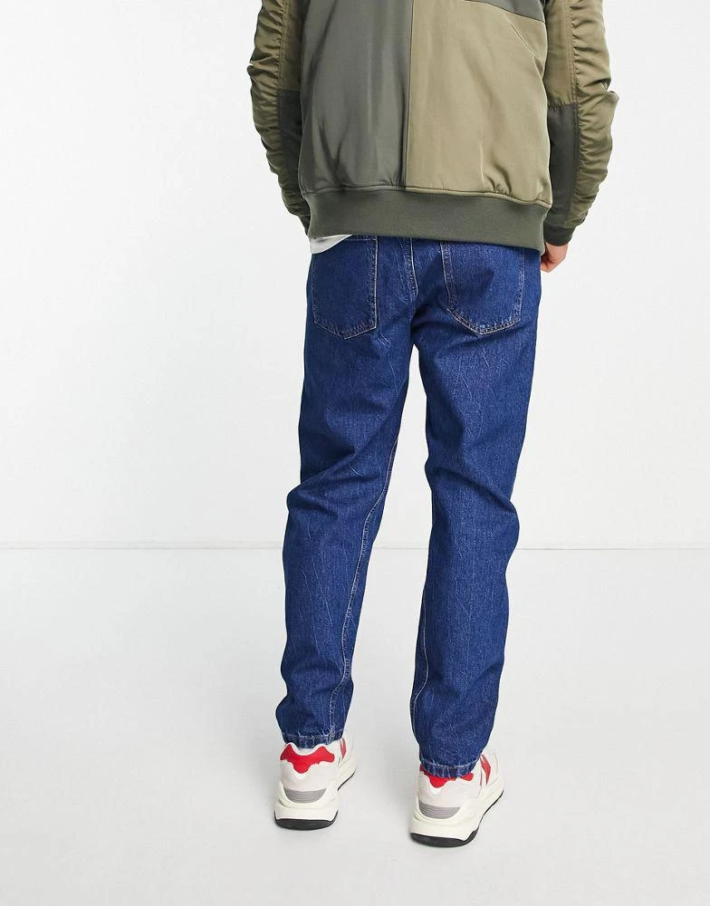 商品Topman|Topman curved leg tapered jeans in indigo,价格¥211,第2张图片详细描述