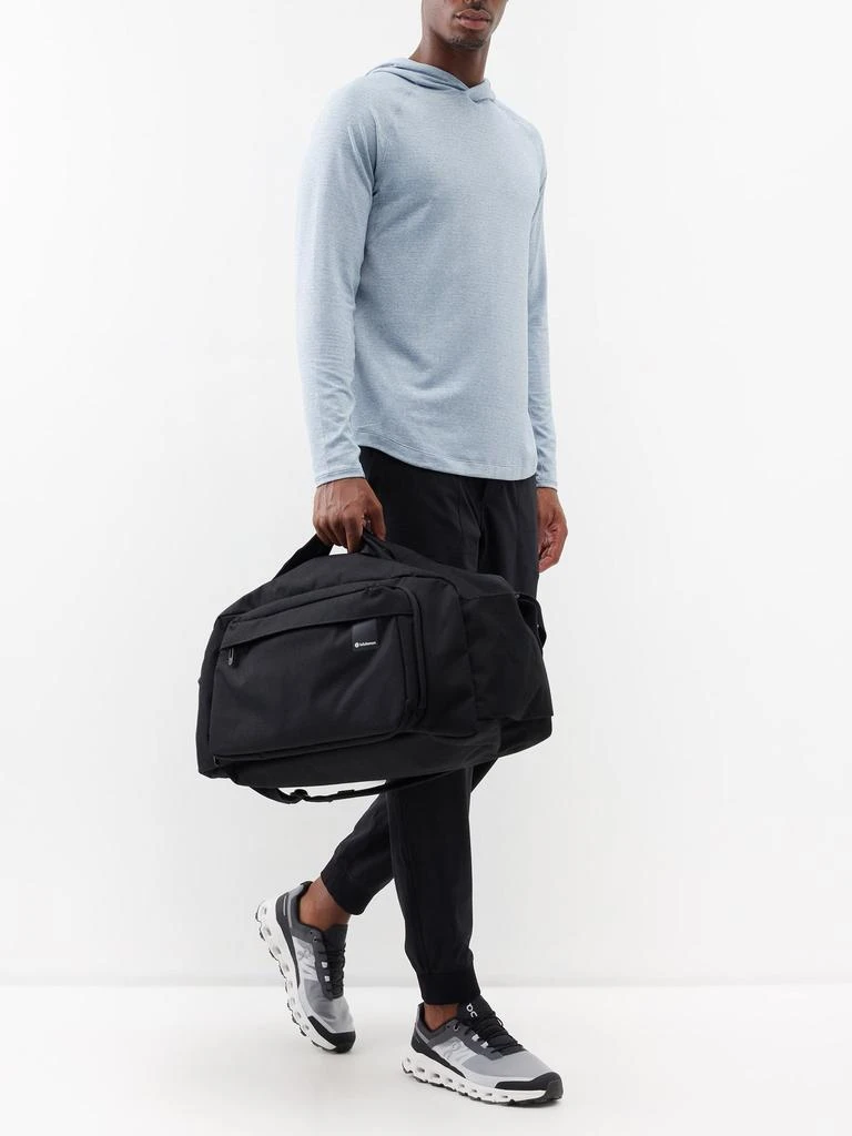 Command The Day recycled-fibre holdall 商品