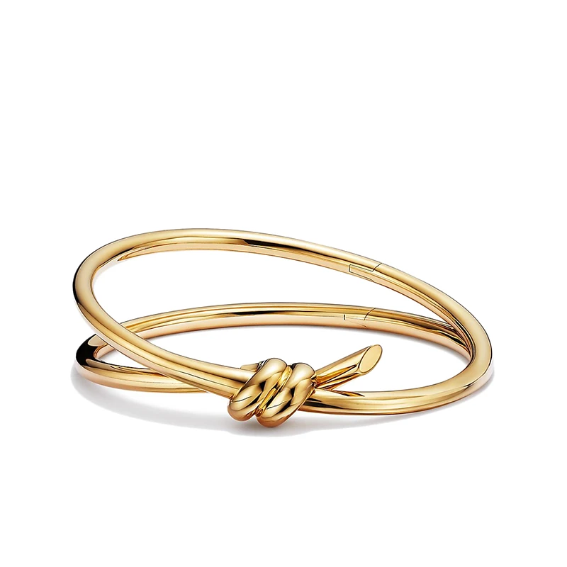 商品Tiffany & Co.|  Tiffany & Co./蒂芙尼 22春夏新款 Knot系列 18K金 黄金色 绳结双行铰链手镯GRP11998,价格¥70827,第1张图片