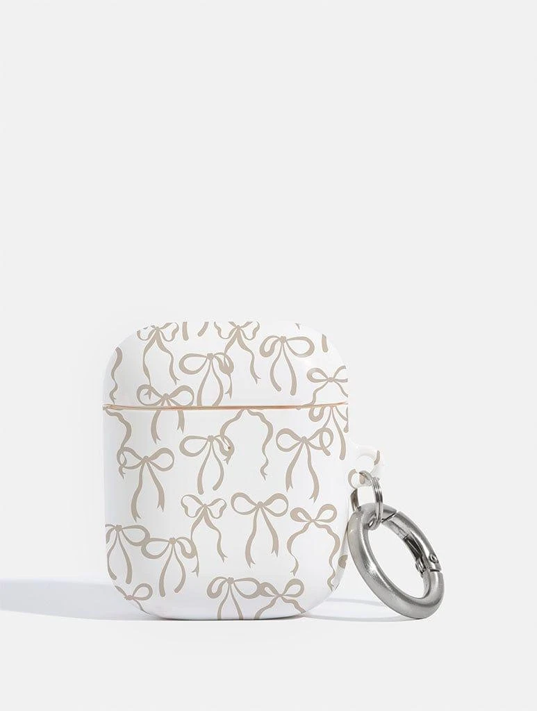 商品Skinnydip London|Neutral Bows AirPods Case,价格¥153,第1张图片详细描述