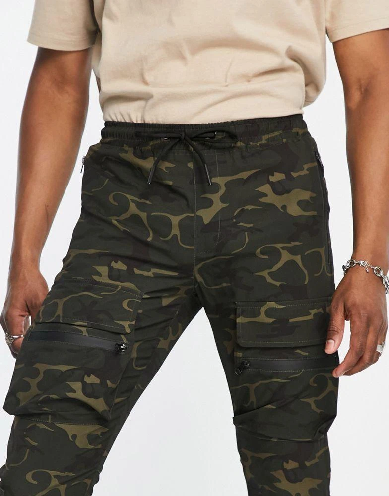 商品American Stitch|American Stitch stretch nylon multi pocket cargo trousers,价格¥370,第3张图片详细描述