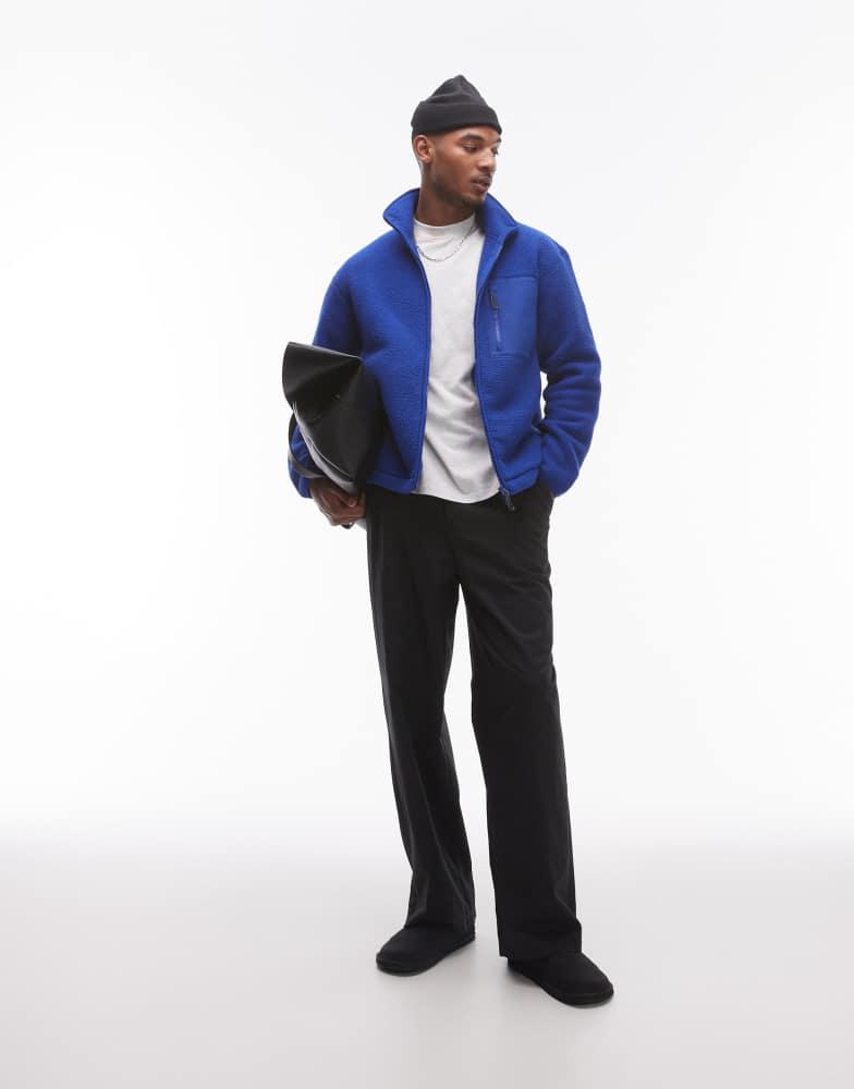 Shop ARKET fleece pile jacket with zip front pocket in bright blue