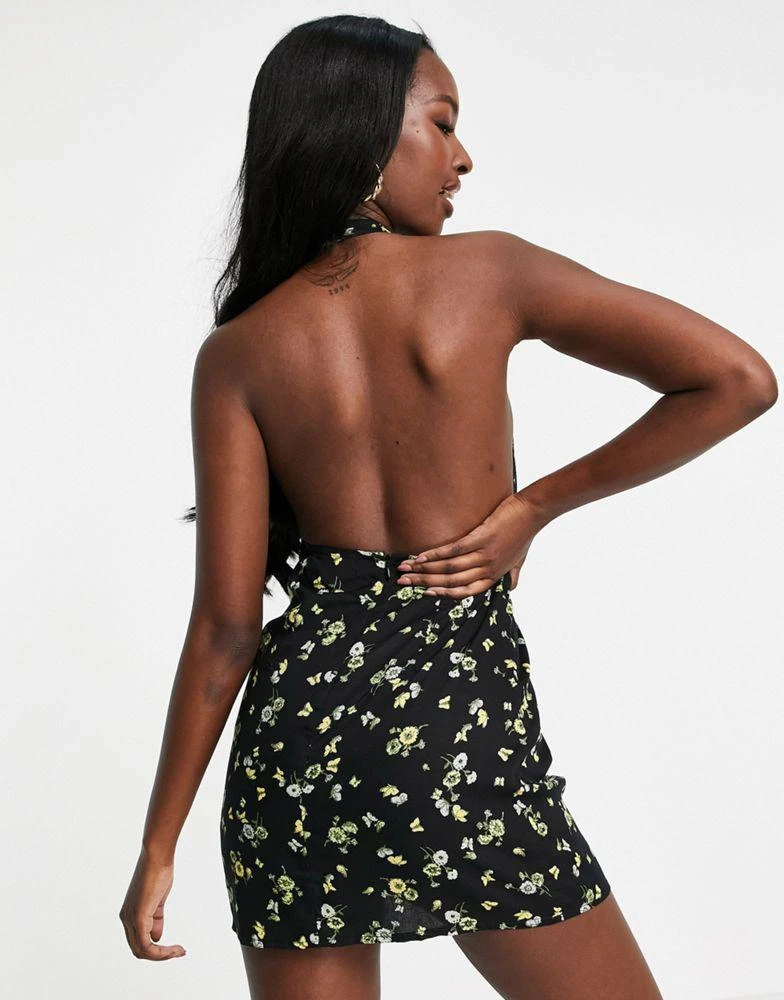 商品Motel|Motel cross front mini dress in lemon black floral,价格¥192,第2张图片详细描述