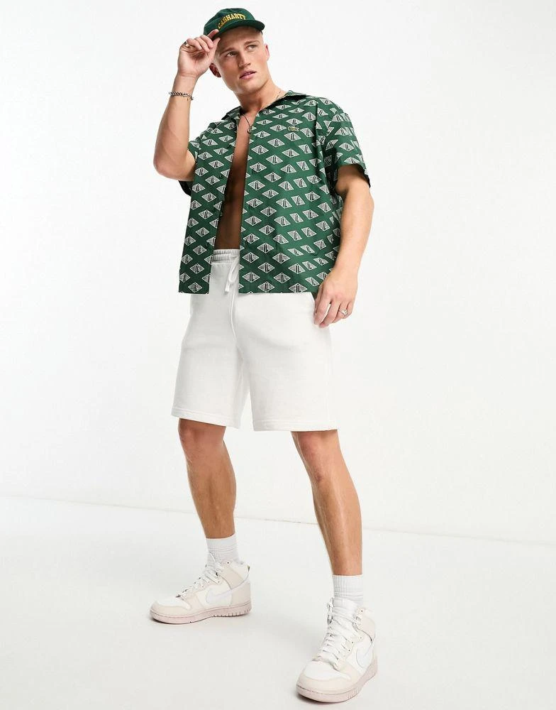 商品Lacoste|Lacoste relaxed fit short sleeve shirt in dark green with all over print,价格¥1235,第4张图片详细描述