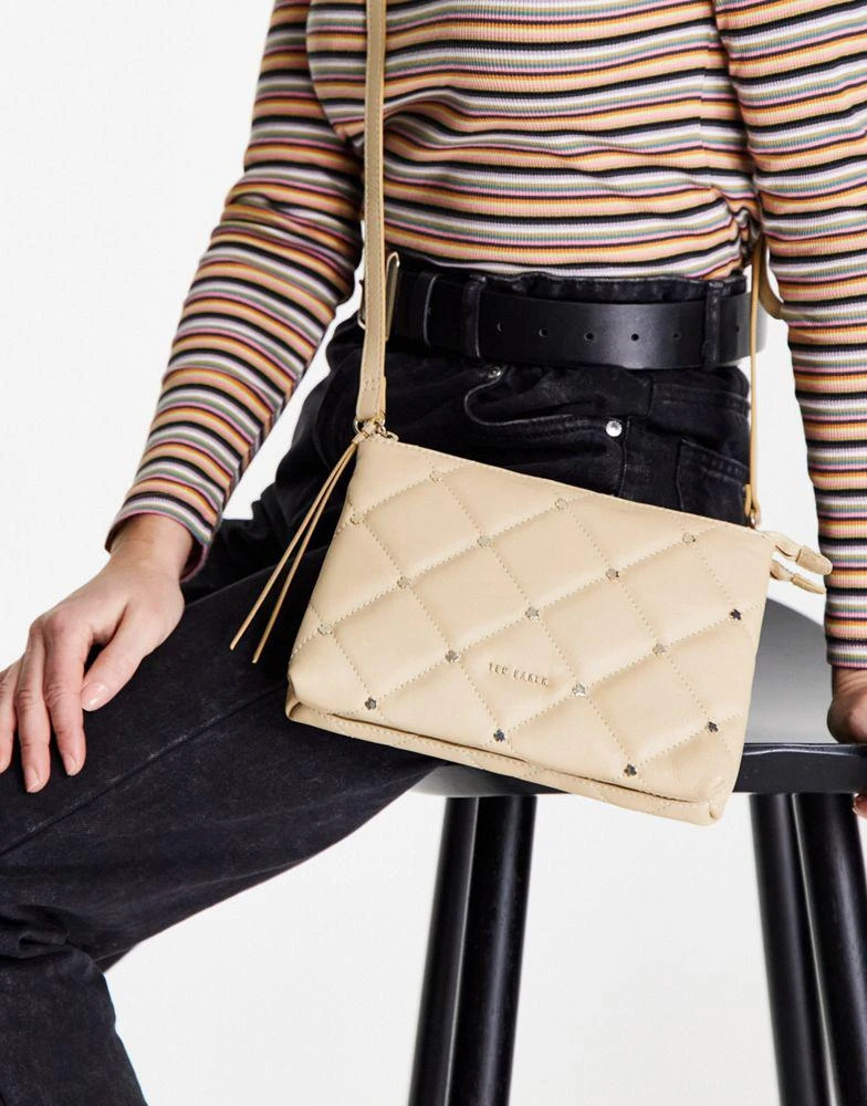 商品Ted Baker London|Ted Baker Parker quilted studded mini cross body bag in cream,价格¥692,第1张图片