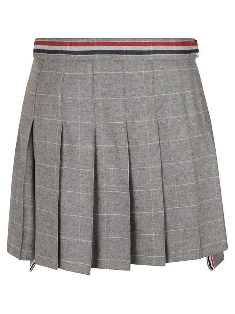 商品Thom Browne|Thom Browne Thigh Length Dropped Back Pleated Skirt,价格¥5959,第1张图片