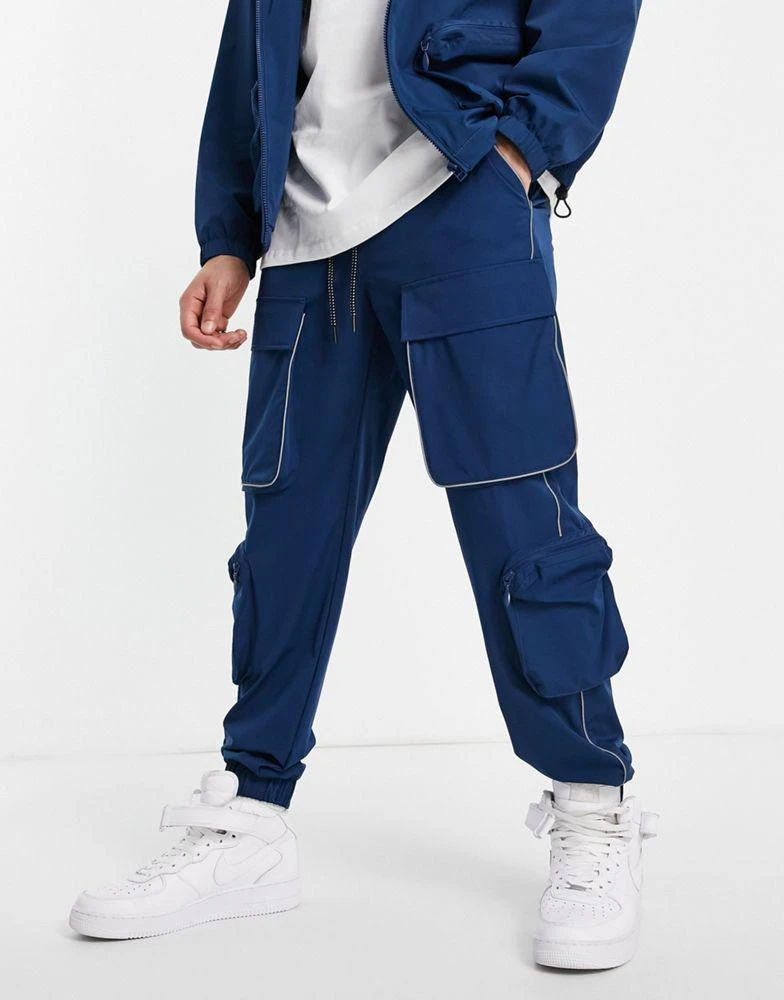 商品Topman|Topman relaxed nylon four pocket co-ord cargo trousers in blue,价格¥245,第1张图片