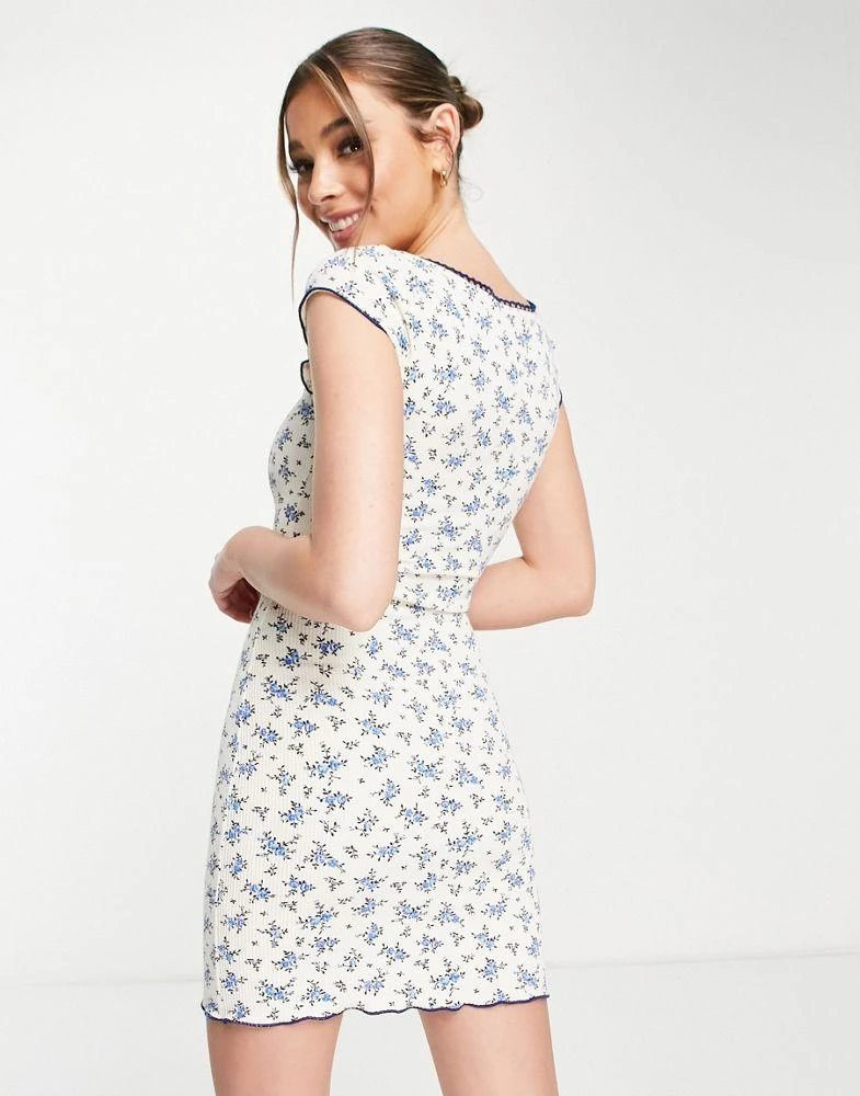 商品ASOS|ASOS DESIGN textured mini cap sleeve dress in cream ditsy floral,价格¥169,第2张图片详细描述