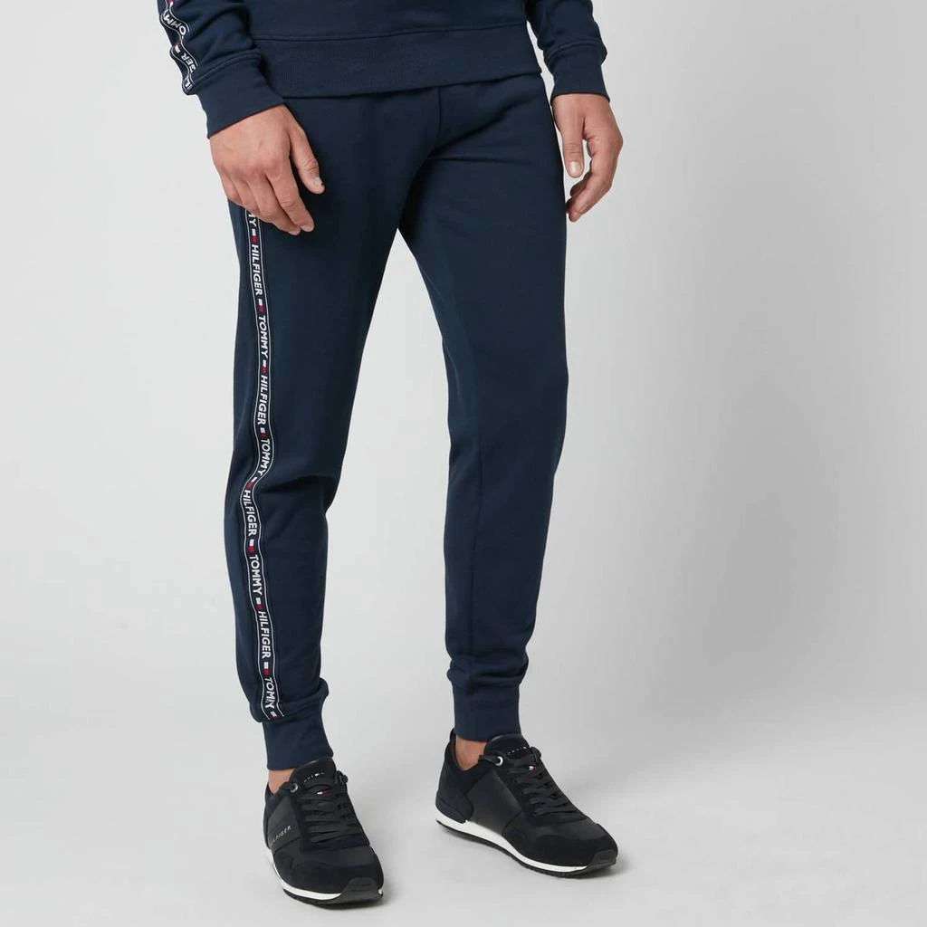 商品Tommy Hilfiger|Tommy Hilfiger Men's Logo Tape Track Pants - Navy Blazer,价格¥371,第1张图片