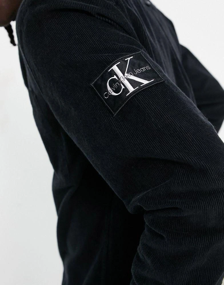 商品Calvin Klein|Calvin Klein Jeans monologo badge corduroy shirt in black,价格¥486,第4张图片详细描述