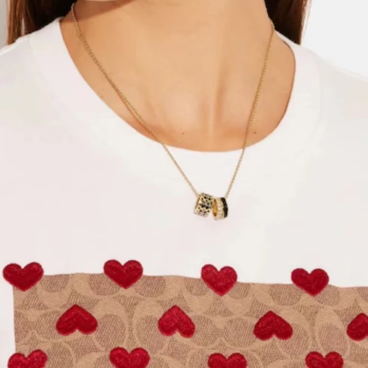商品[国内直发] Coach|蔻驰 标志三环吊坠 字母印花 黄铜 项链 女款 黑色,价格¥981,第4张图片详细描述