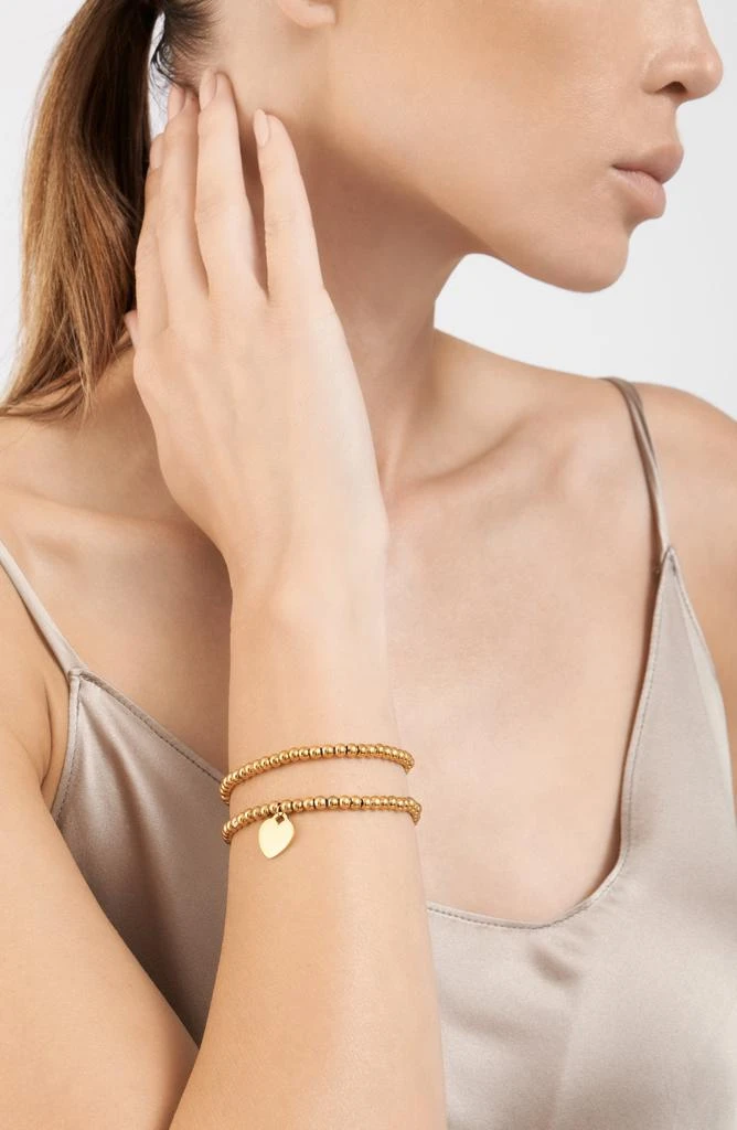 商品ADORNIA|Set of Ball Bracelet - One Plain and One with Heart - gold,价格¥520,第2张图片详细描述
