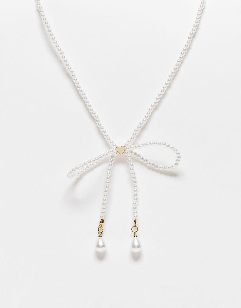 商品Reclaimed Vintage|Reclaimed Vintage skinny pearl bow necklace,价格¥83,第1张图片